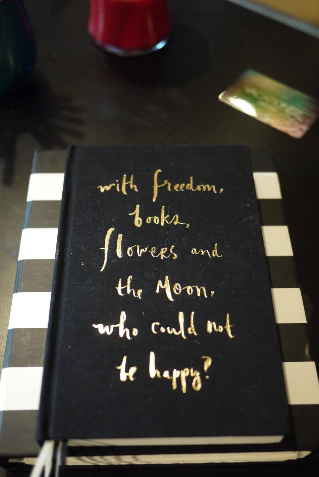 With freedom, books, flowers, and the moon, who could not be happy?